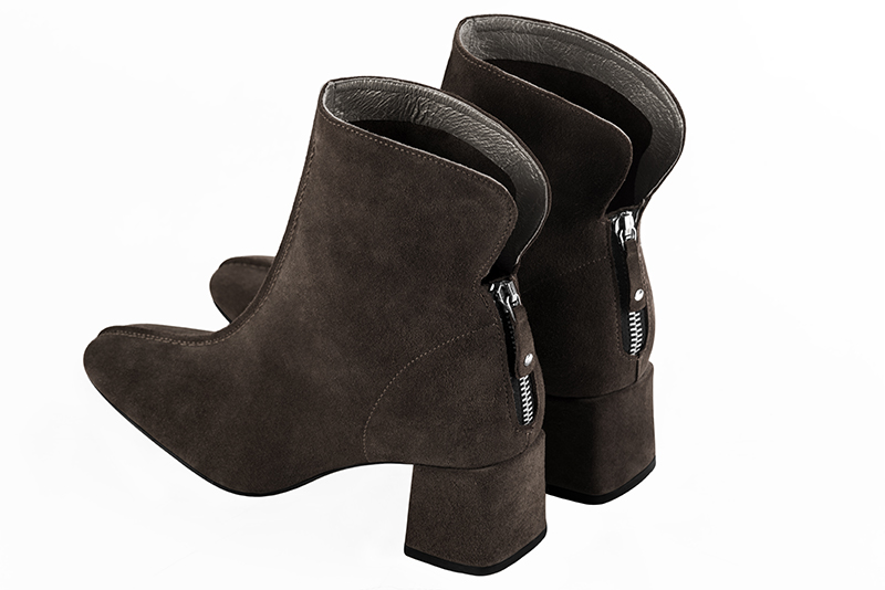 Dark brown women's ankle boots with a zip at the back. Square toe. Medium block heels. Rear view - Florence KOOIJMAN